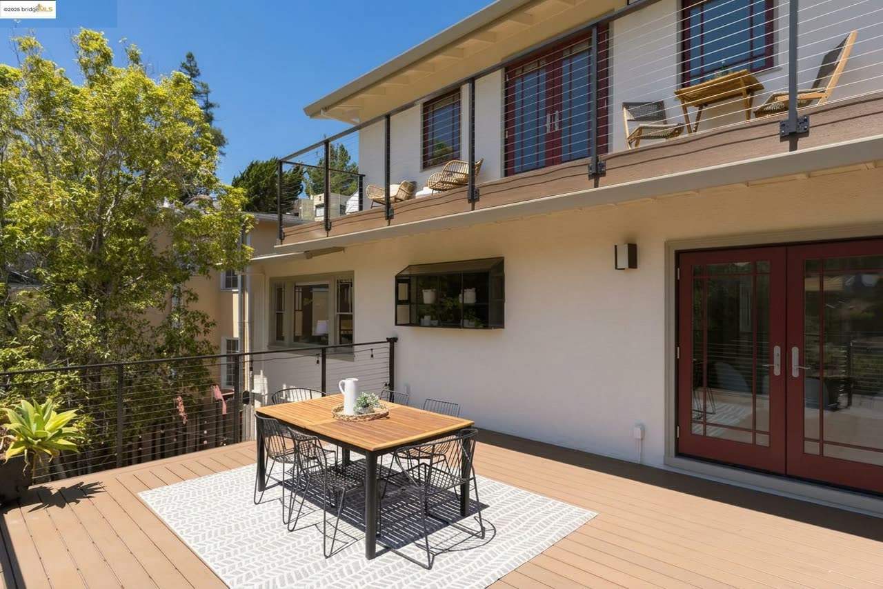 The deck by day, looking out over the trees.
