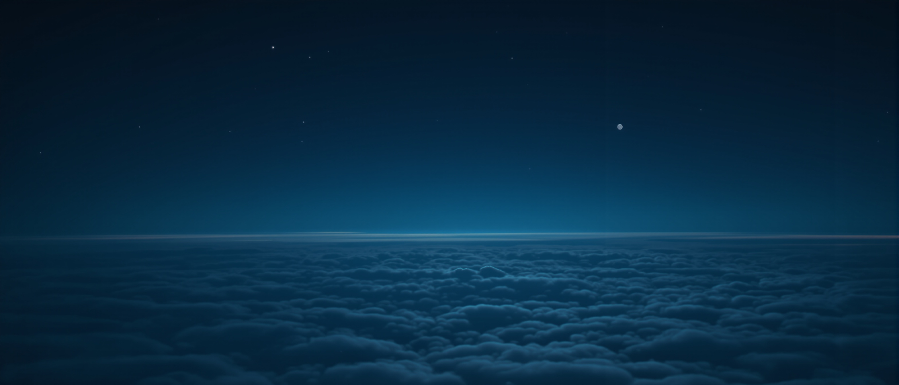 Night sky above a sea of clouds, stars over the range.
